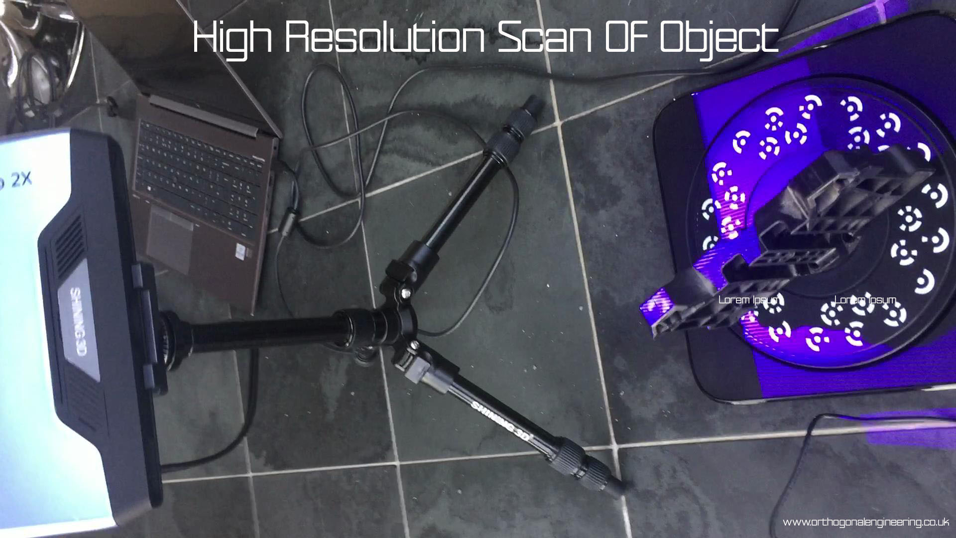 High Resolution scanner imaging a bracket which is mounted on a rotating turntable